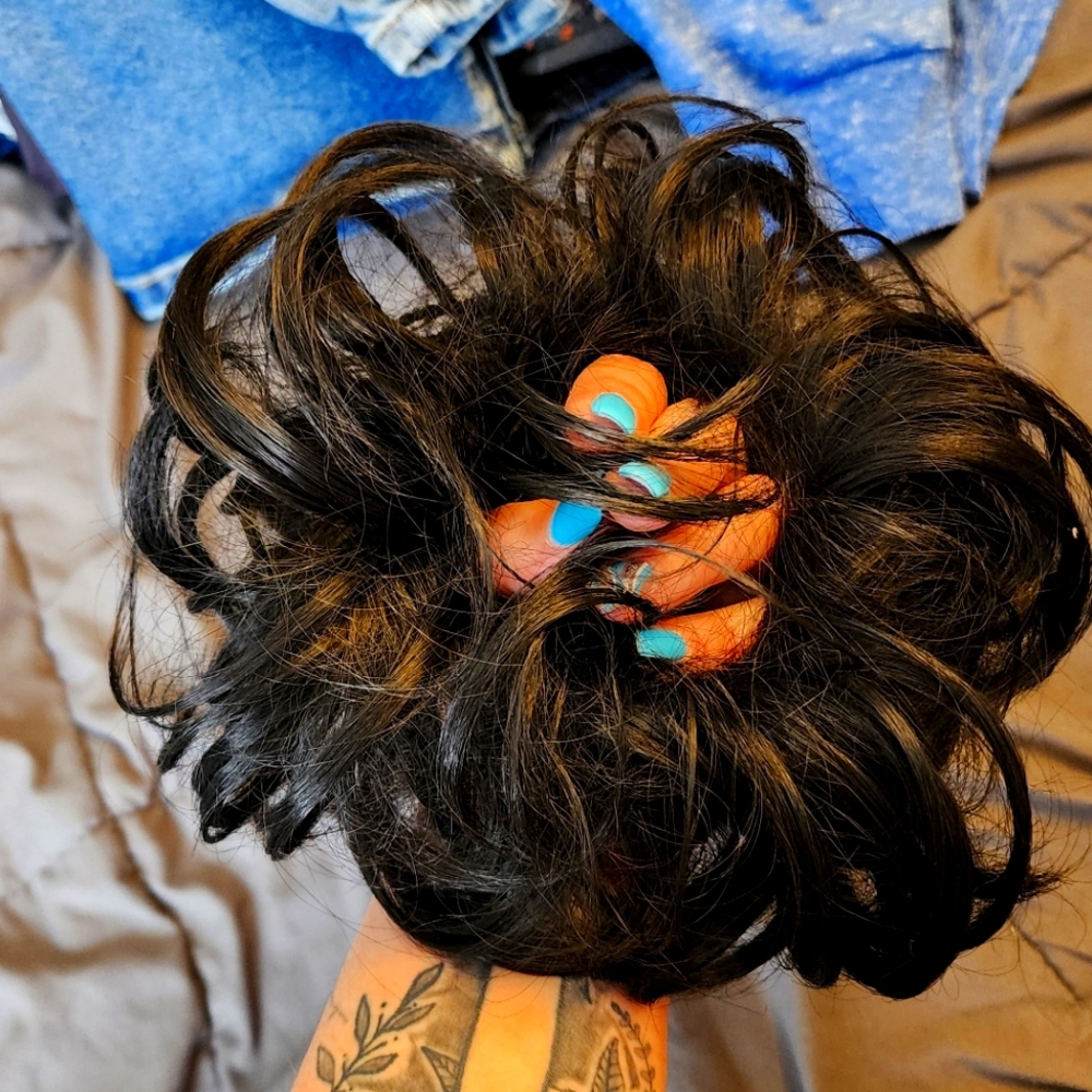 Black hair piece